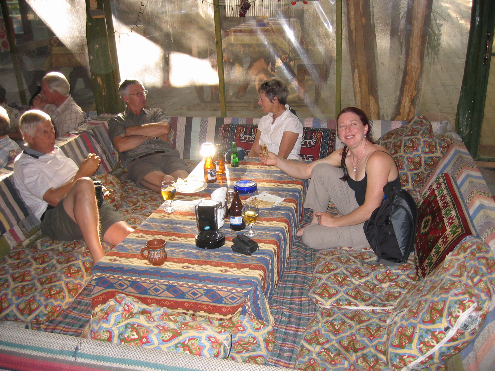 The Group enjoys a snack in the shade and comfy sofas.